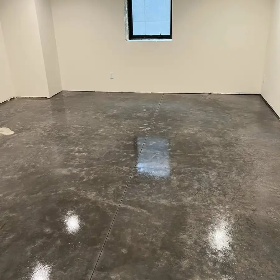 After: concrete floor cleaned and sealed to a glossy finish